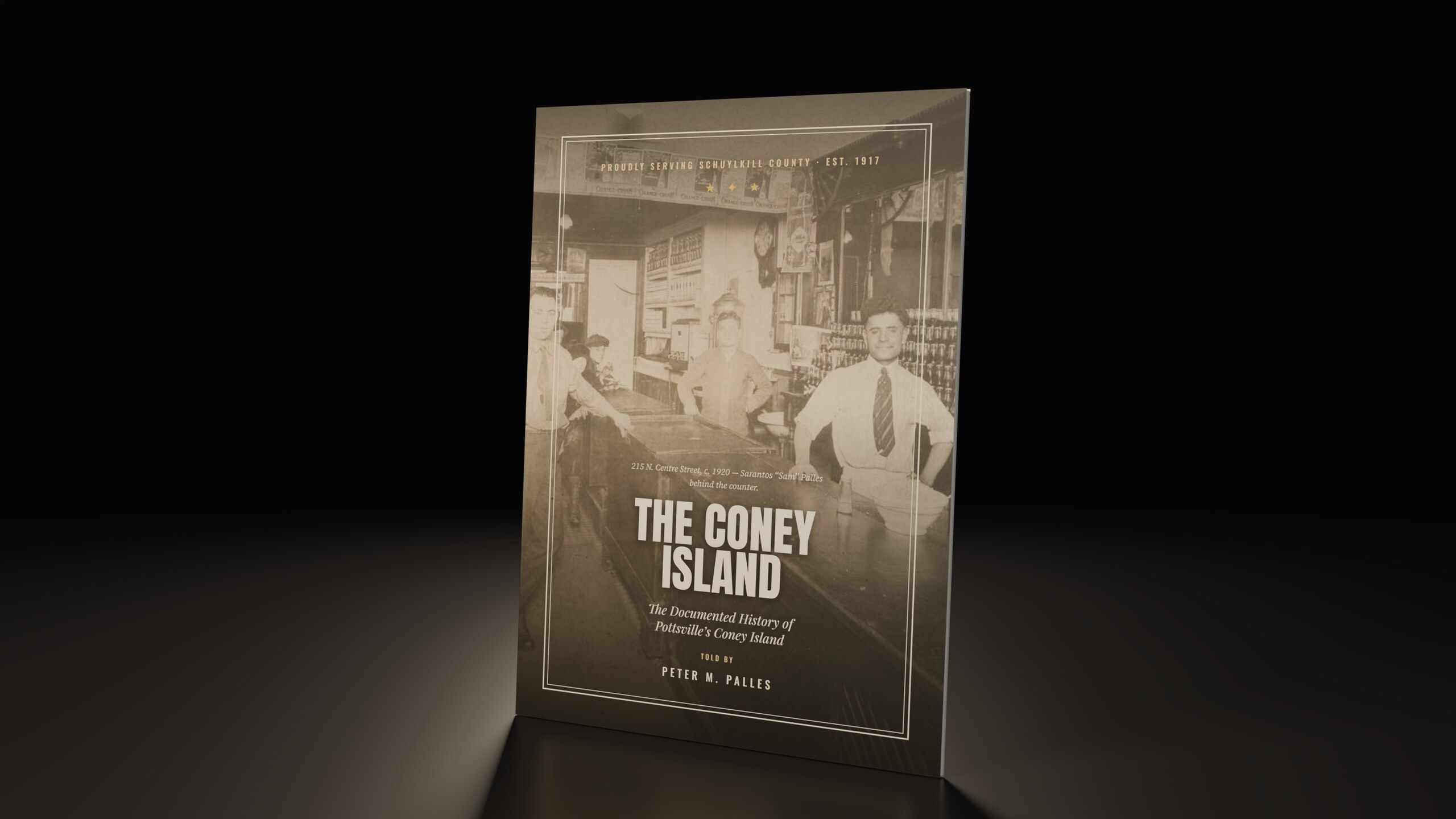 The Coney Island paperback standing on a dark floor: a sepia photograph of Sam Palles behind the counter, c. 1920, under the title.